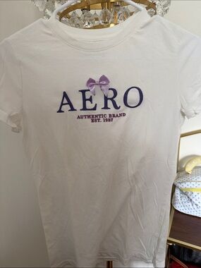 AERO Girls' White Short Sleeve Logo Tee with Lavender Bow